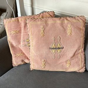 Two embroidered pillows from Zara Home.